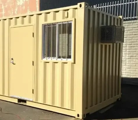 Modified Shipping Container with Door, Window and Air Conditioner - Grand Box Northwest